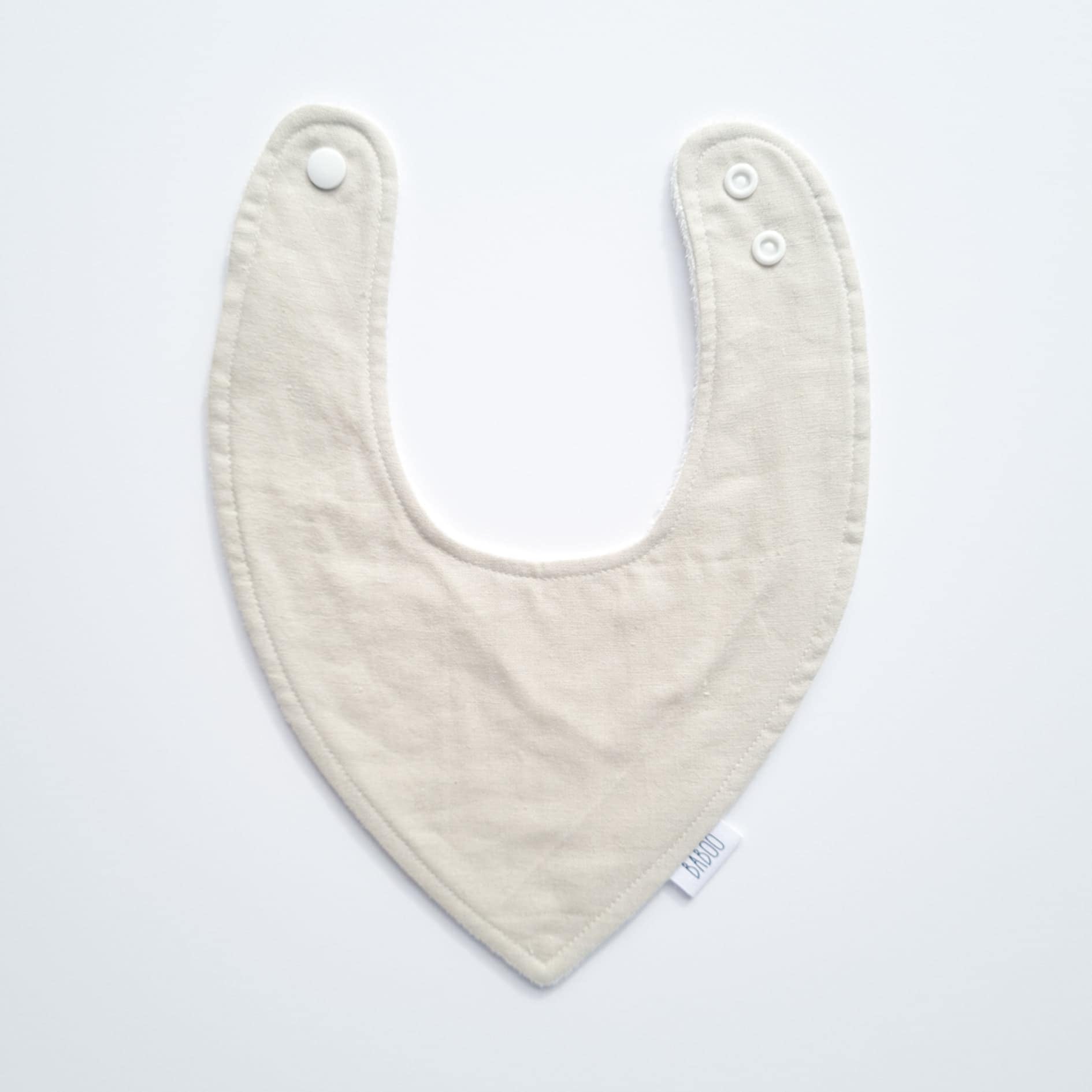 Beige dribble bib